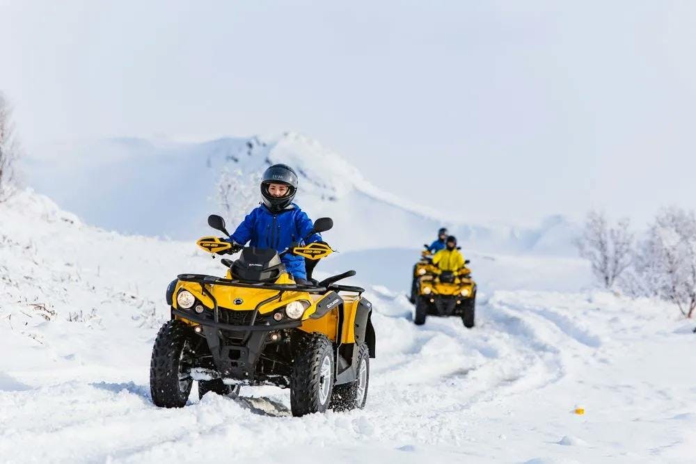 Guided ATV tour exploring Iceland's mountains in winter